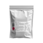 Sambal Chilli Paste in a pouch with a spoonful of spicy paste next to a plate of fried rice and fresh vegetables
